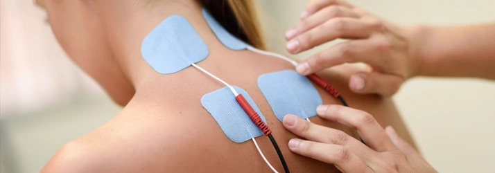 Chiropractic-San-Antonio-TX-Woman-Receiving-Interferential-Current-Therapy (1)